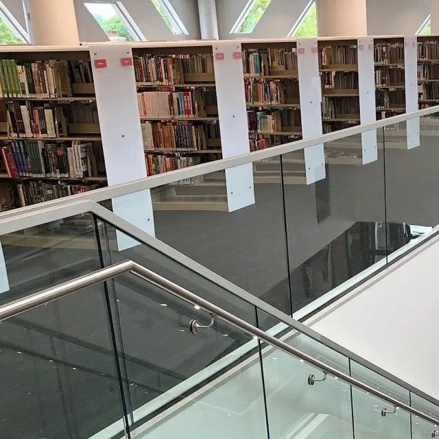 Elegant Smoked Glass Railing with Durable Black Coating