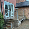 Powder Coated Black Steel Posts with Side Mounted Tempered Glass Railing