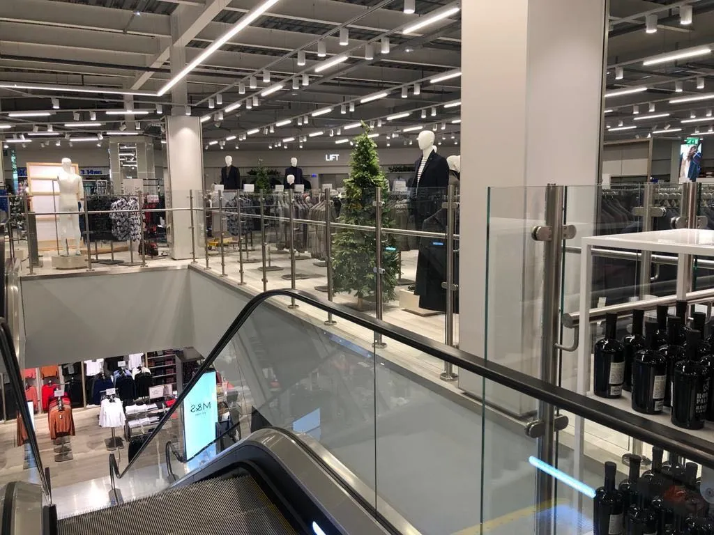 Sleek Modern Glass Railing with Durable Wire Handrail